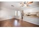 Inviting living space flows into the modern kitchen, with hardwood floors and neutral paint throughout at 3025 Yankee Clipper Dr, Las Vegas, NV 89117