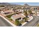Stunning aerial view of a home with well-maintained landscaping and a tile roof at 3101 Hayden Ct, Las Vegas, NV 89134
