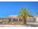 Inviting single-story house with a tile roof and a well-manicured desert landscape at 3101 Hayden Ct, Las Vegas, NV 89134