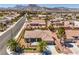 Inviting single-story residence with lush palm trees, desert landscaping, and a cozy covered front porch, perfect for relaxation at 3101 Hayden Ct, Las Vegas, NV 89134
