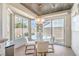 Bright kitchen nook with modern lighting and views of outdoor patio at 3101 Hayden Ct, Las Vegas, NV 89134