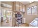 Laundry room features modern appliances, extra storage, and access to breakfast nook at 3101 Hayden Ct, Las Vegas, NV 89134