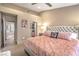 Bedroom features plush bed, closet, and entry to the en-suite bathroom for easy accessibility at 3101 Hayden Ct, Las Vegas, NV 89134