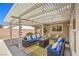 Cozy patio area with comfortable seating, an elegant pergola, and stylish outdoor decor at 3101 Hayden Ct, Las Vegas, NV 89134