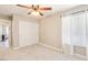 Well-lit bedroom with a closet and large window offering natural light at 3249 Palmdesert Way, Las Vegas, NV 89120