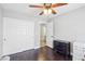Carpeted bedroom with closet and adjacent bathroom access at 3249 Palmdesert Way, Las Vegas, NV 89120