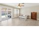 Inviting living room with tile floors and sliding glass doors leading to the pool at 3249 Palmdesert Way, Las Vegas, NV 89120