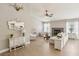 Bright, airy living space with tile floors, fireplace, and stylish furnishings at 3249 Palmdesert Way, Las Vegas, NV 89120