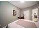Bedroom featuring a neutral palette, comfortable bed, and closet at 3696 Waynesvill St, Las Vegas, NV 89122