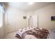 Comfortable bedroom with double closet, soft carpet, and a relaxing atmosphere at 3696 Waynesvill St, Las Vegas, NV 89122