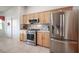 Kitchen showcases stainless steel appliances, modern countertops, and plenty of storage at 3696 Waynesvill St, Las Vegas, NV 89122