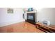 Bright living room with hardwood floors, a fireplace, and a neutral color palette at 3696 Waynesvill St, Las Vegas, NV 89122