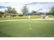 An artificial putting green adds to the community's recreational amenities at 3696 Waynesvill St, Las Vegas, NV 89122