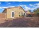 Cozy backyard with patio, seating, string lights, and barbeque at 3741 Round Robin St, North Las Vegas, NV 89032