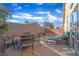 Inviting backyard patio area with comfortable seating and string lights at 3741 Round Robin St, North Las Vegas, NV 89032