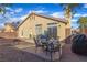 Charming backyard with patio, seating, and string lights at 3741 Round Robin St, North Las Vegas, NV 89032
