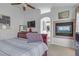 Bedroom with fireplace and ensuite bathroom access at 3741 Round Robin St, North Las Vegas, NV 89032