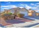 Beautiful single-story home with a well-maintained front yard and attached two-car garage at 3741 Round Robin St, North Las Vegas, NV 89032