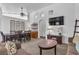 Inviting living room featuring carpeted floors and ample natural light, perfect for relaxation and entertainment at 3741 Round Robin St, North Las Vegas, NV 89032