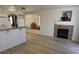 Spacious living room with an island, granite countertops and a cozy fireplace at 3741 Round Robin St, North Las Vegas, NV 89032