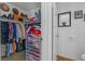 Walk-in closet next to the toilet features ample storage space and organization at 3741 Round Robin St, North Las Vegas, NV 89032