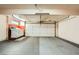 Spacious garage with tile and smooth flooring, offering ample storage space at 4338 Caliente St # 11, Las Vegas, NV 89119