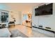 Comfortable living room with a television, dining area and a view of the front entry at 4338 Caliente St # 11, Las Vegas, NV 89119