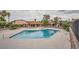 Community pool and spa with ample deck space for relaxation and socializing at 4338 Caliente St # 11, Las Vegas, NV 89119