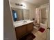 Full bathroom featuring a vanity with sink, a toilet, and a shower-tub combo, ideal for a house guest at 4555 E Sahara Ave # 166, Las Vegas, NV 89104
