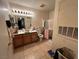 Bathroom featuring a vanity, toilet, and a shower-tub combination, designed with tile flooring at 4555 E Sahara Ave # 166, Las Vegas, NV 89104