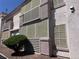 Exterior view of the building with landscaping and updated finishes at 4555 E Sahara Ave # 166, Las Vegas, NV 89104