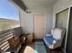 Enclosed patio features an outdoor chair and a privacy screen at 4555 E Sahara Ave # 166, Las Vegas, NV 89104