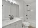 Modern bathroom features updated vanity, new paint, new fixtures and a shower-tub combo at 4623 Kearney St, Las Vegas, NV 89147