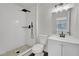 Modern bathroom features sleek shower, updated vanity, new flooring and stylish fixtures at 4623 Kearney St, Las Vegas, NV 89147