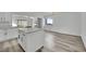 Bright open kitchen with island bar and view of the fireplace at 4623 Kearney St, Las Vegas, NV 89147
