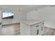 Bright kitchen with a central island and view of a window in the background at 4623 Kearney St, Las Vegas, NV 89147