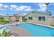 Backyard pool features a built-in spa and covered patio area at 4623 Kearney St, Las Vegas, NV 89147
