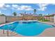 Backyard pool features a spa, waterfall feature, and lush landscaping at 4623 Kearney St, Las Vegas, NV 89147