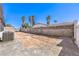 Spacious backyard featuring a blank canvas and block wall fencing for privacy, with palm tree views at 4774 San Sebastian Ave, Las Vegas, NV 89121