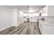 Bright kitchen features white cabinets, stainless appliances, and marble countertops at 4774 San Sebastian Ave, Las Vegas, NV 89121