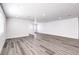 Spacious living room boasts updated flooring, recessed lighting, and ample natural light streaming through large windows at 4774 San Sebastian Ave, Las Vegas, NV 89121