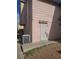 Image shows the building's exterior with a secure, gated door at 5248 Greene Ln # B, Las Vegas, NV 89119