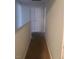 Hallway featuring a carpeted floor and access to other rooms at 5248 Greene Ln # B, Las Vegas, NV 89119
