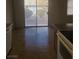 Kitchen and dining area featuring sliding doors to the exterior at 5248 Greene Ln # B, Las Vegas, NV 89119
