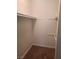 Walk-in closet showing installed shelving and carpeted floor at 5248 Greene Ln # B, Las Vegas, NV 89119