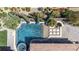 Birds-eye view of a private backyard with swimming pool, jacuzzi and outdoor cooking space at 5410 Serenity Brook Dr, Las Vegas, NV 89149
