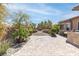 Backyard showing fireplace and sitting area, with custom patio hardscape at 5410 Serenity Brook Dr, Las Vegas, NV 89149