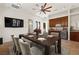 Elegant dining room featuring a large table, stylish chairs, and a convenient serving area at 5410 Serenity Brook Dr, Las Vegas, NV 89149
