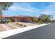 A charming single story home with desert landscaping and paver driveway at 5410 Serenity Brook Dr, Las Vegas, NV 89149