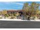 Charming single-story home with stone accents, manicured landscaping, and welcoming entrance at 5410 Serenity Brook Dr, Las Vegas, NV 89149